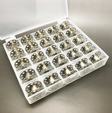 25 Metal bobbins in a box
